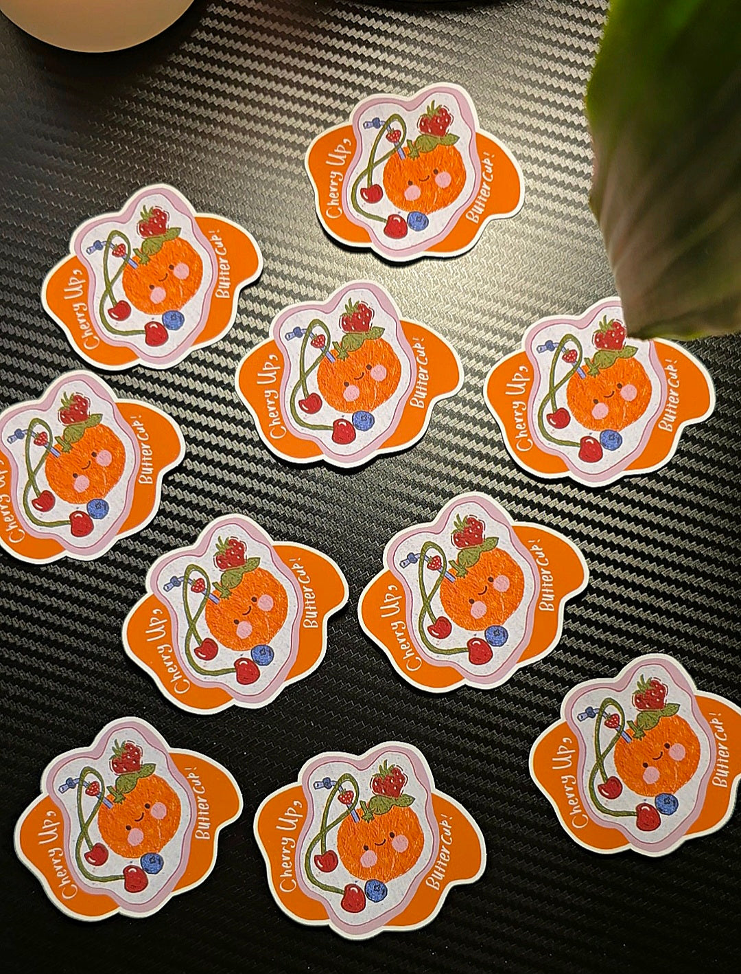 Cherry Up Buttercup matte vinyl die-cut sticker group photo showing multiple stickers on dark background