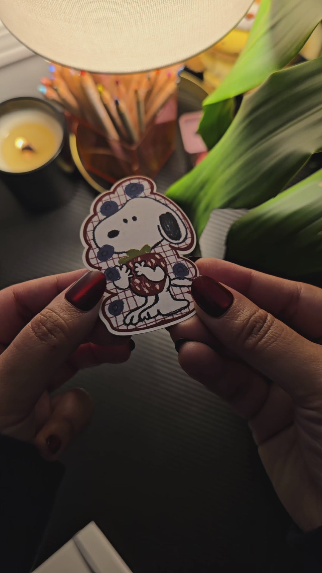 Berry Cute Snoopy die-cut sticker – Snoopy wearing a red plaid blueberry-print outfit, hugging a strawberry, matte vinyl, 2x3 inch