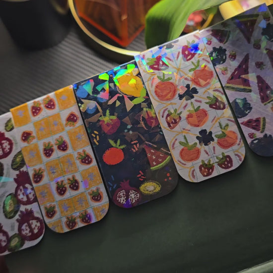 Tropical Series Holographic Magnetic Bookmarks – 5 designs: Fruit Punch, Yellow Berry Grid, Peach & Strawberry, Watermelon & Berry, and Pomegranate & Kiwi, with holographic shimmer effect